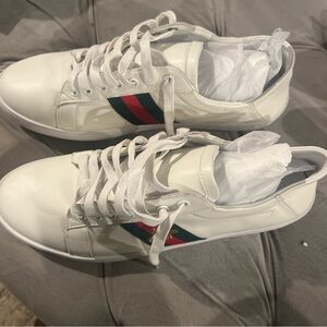Brand new men Gucci sneakers. Size 46. Never worn. No box only cloth bag.